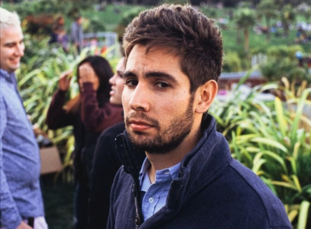 Young Man Looks At Camera